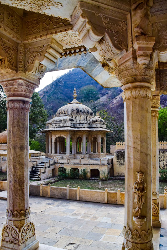 services-01 Explore the intricate columns of Jaipur's iconic Gaitore Ki Chhatriyan monument captured in this architectural shot.
